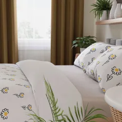 Radosny wzór stokrotek na jasnym tle w sypialni w stylu boho.