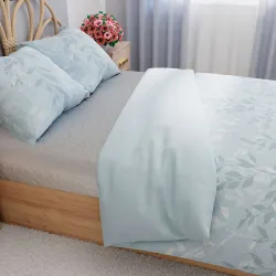 Pościel LILU w przytulnej sypialni inspirowanej naturą.